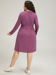 Solid Notched Pocket Pleated Belted Dress