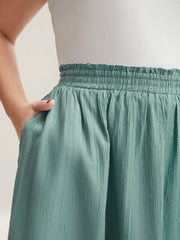 Smocked Waist Textured Pleated Midi Skirt