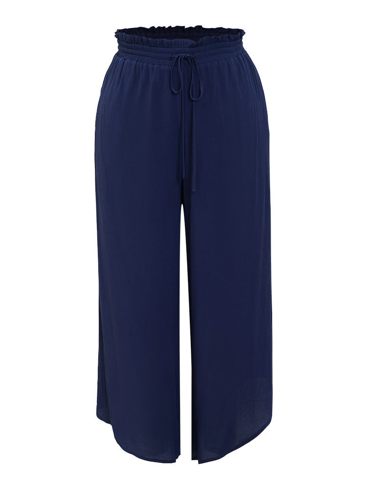 Solid Paperbag Waist Asymmetrical Hem Wide Leg Pants