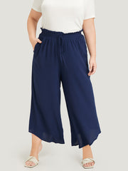 Solid Paperbag Waist Asymmetrical Hem Wide Leg Pants
