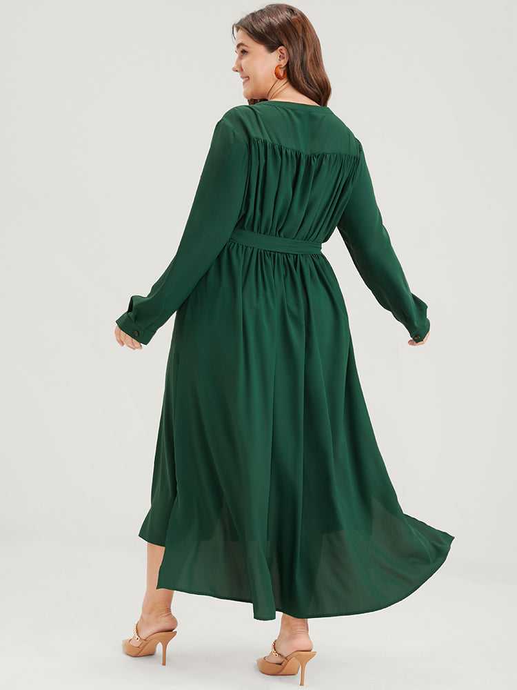 Solid V Neck Pocket Button Asymmetrical Flutter Hem Belted Dress