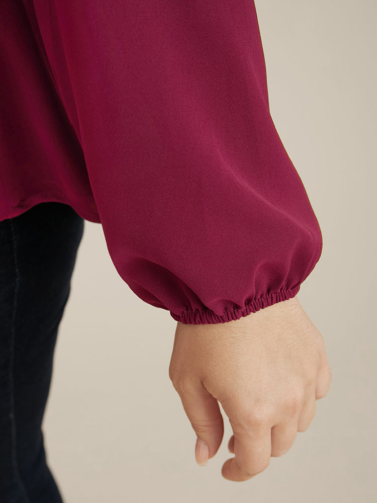 Solid Lantern Sleeve Surplice Neck Asymmetrical Hem Blouse