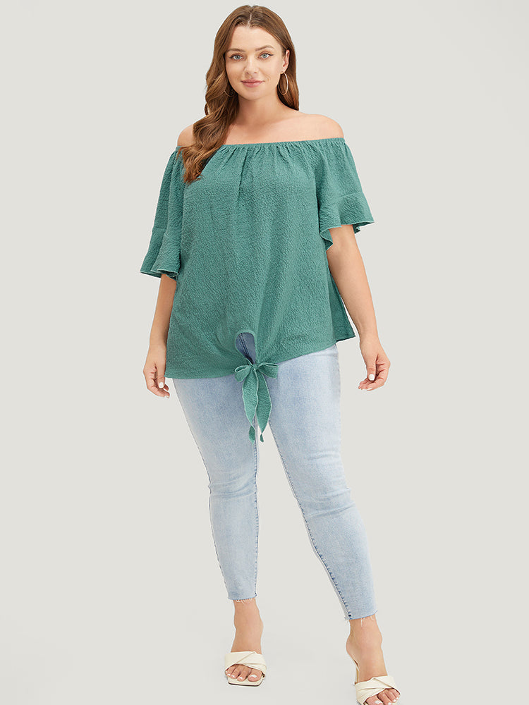 Solid Cut Out Knotted Hem Ruffle Sleeve One Shoulder Blouse