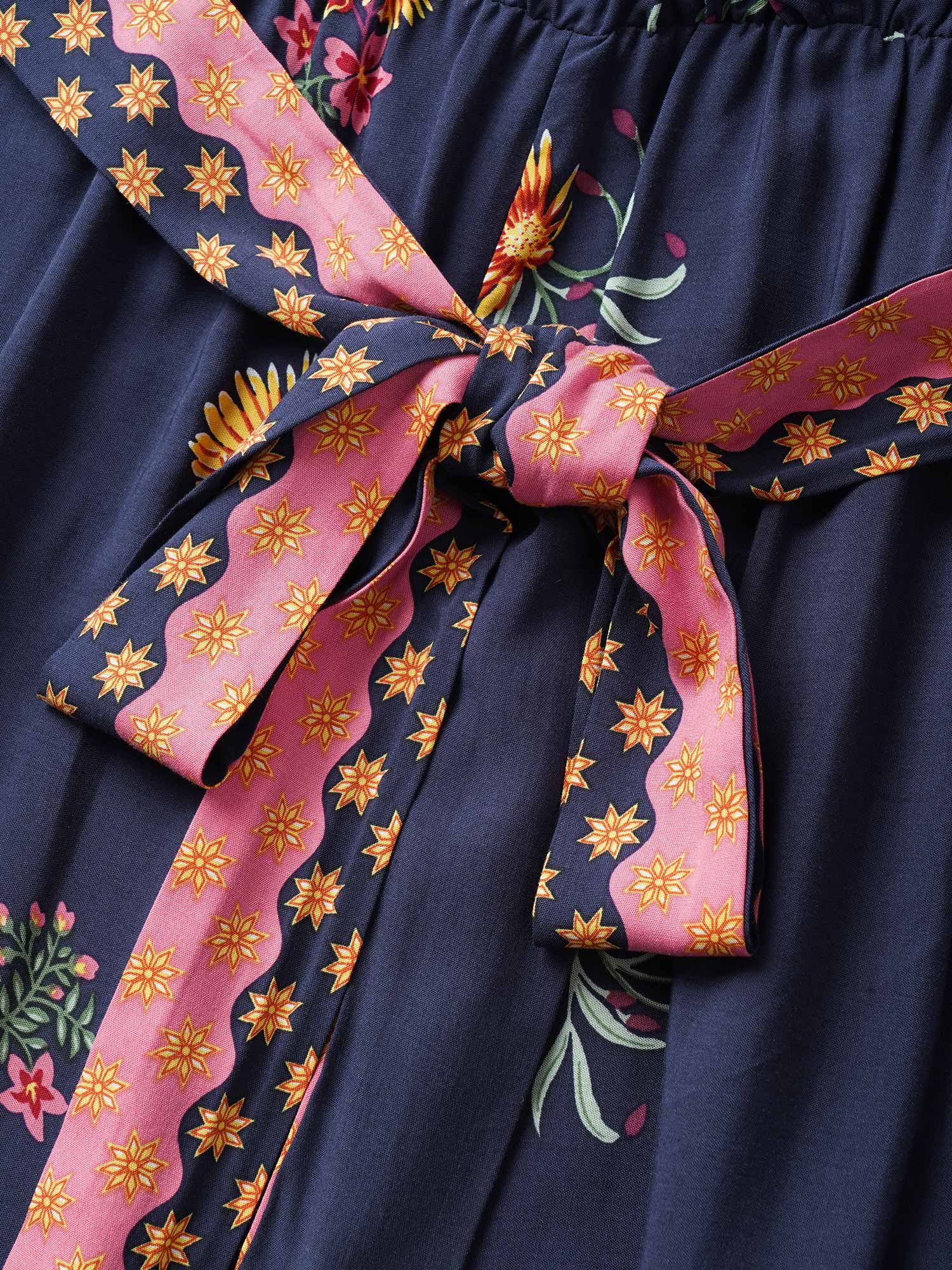 Boho Print Overlap Collar Belted Sleeveless Jumpsuit