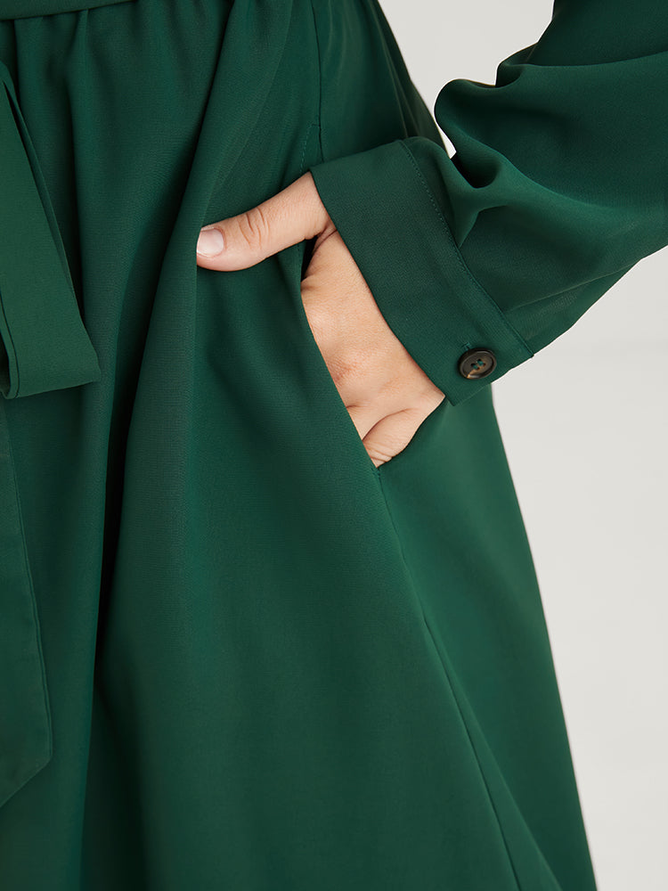 Solid V Neck Pocket Button Asymmetrical Flutter Hem Belted Dress