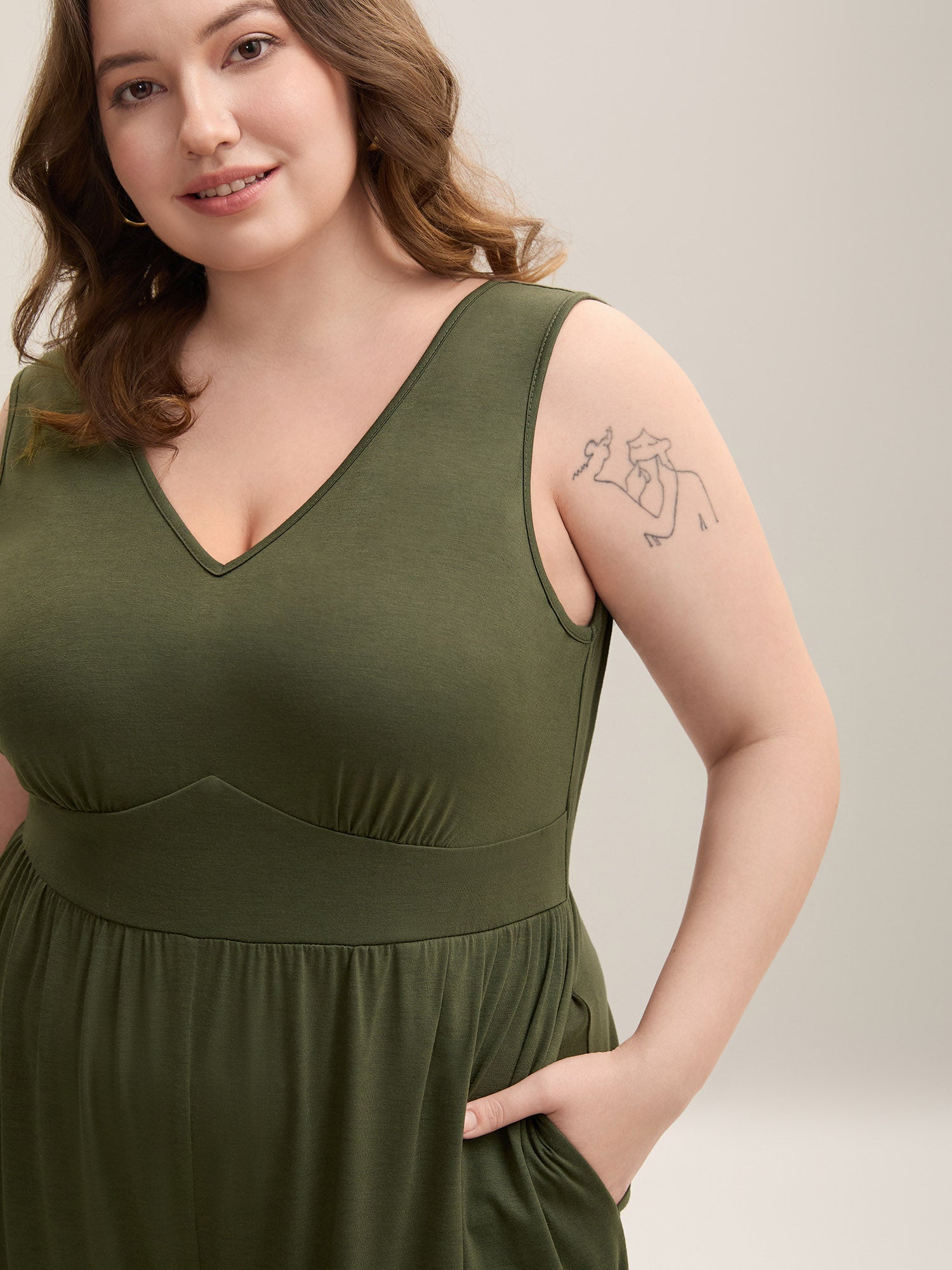 Stretchy Knit Pockets Cross Back Jumpsuit