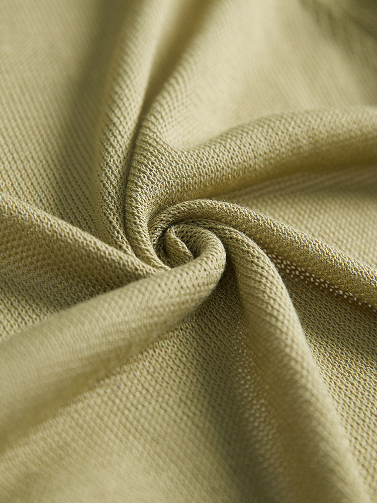 Solid Patched Pocket Geometric Eyelet Raglan Sleeve Cardigan