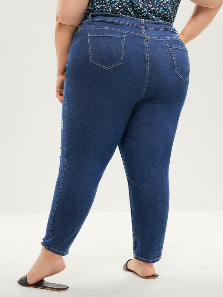 Skinny Moderately Stretchy Mid Rise Medium Wash Pocket Jeans